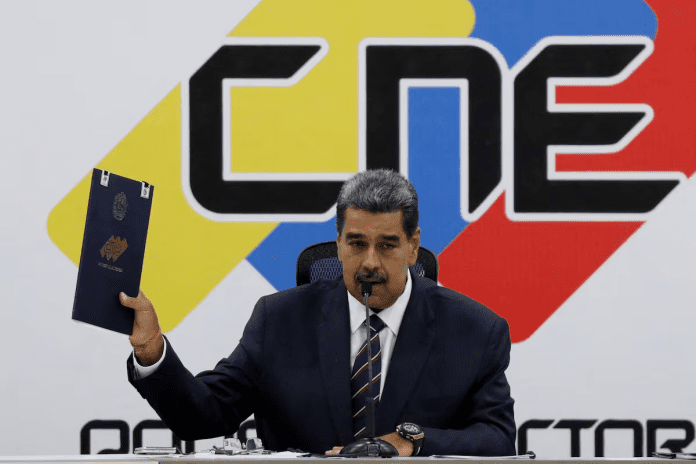 Nicolás Maduro tras anunciarse como ganador en las elecciones de este domingo, el 29 de julio en Caracas (Venezuela). Leonardo Fernandez Viloria (REUTERS)