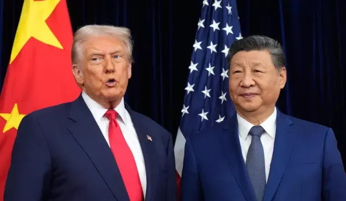 President Donald Trump, left, and Chinese President Xi Jinping pose together ahead of their summit talk at Gimhae International Airport in Busan, South Korea, Thursday, Oct. 30, 2025. (AP Photo/Mark Schiefelbein)